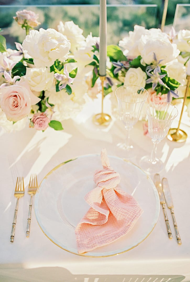 Knotted napkin lies on a plate on a set table