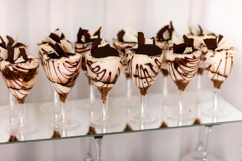 Traditional Italian dessert tiramisu in a glass. wedding dessert for the holidays.