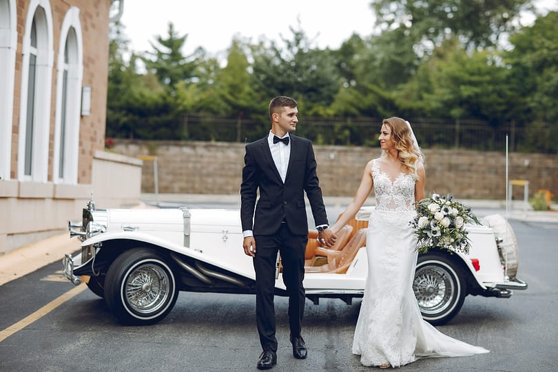 Couple near old car