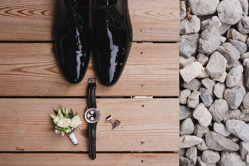 top-view-of-boutonniere-shoes-watch-cufflinks-a-2025-03-09-15-51-45-utc