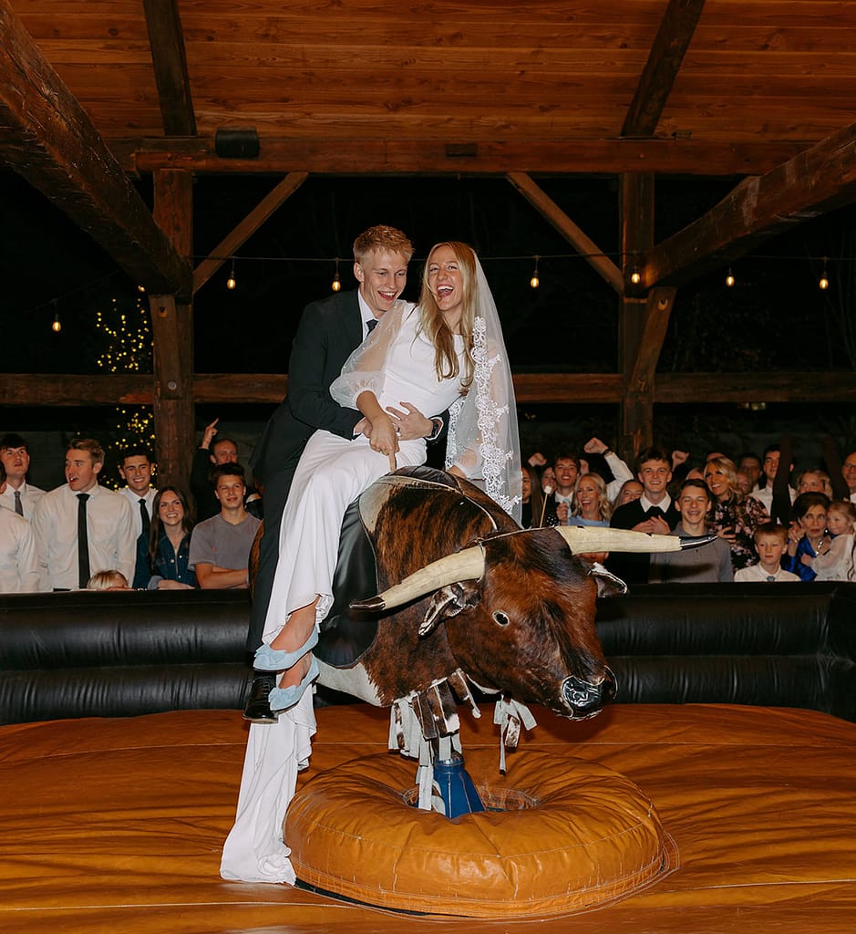 Buck Wild Bride and Groom - Bay + Bre Photo - Mechanical Bull Riding Rental Wedding Vendor